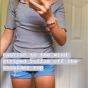 caution to the wind- striped ruffle top